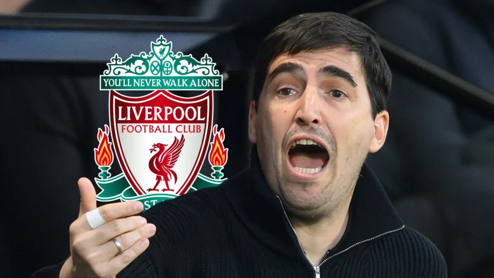 Entrenador dando instrucciones con logo de Liverpool
