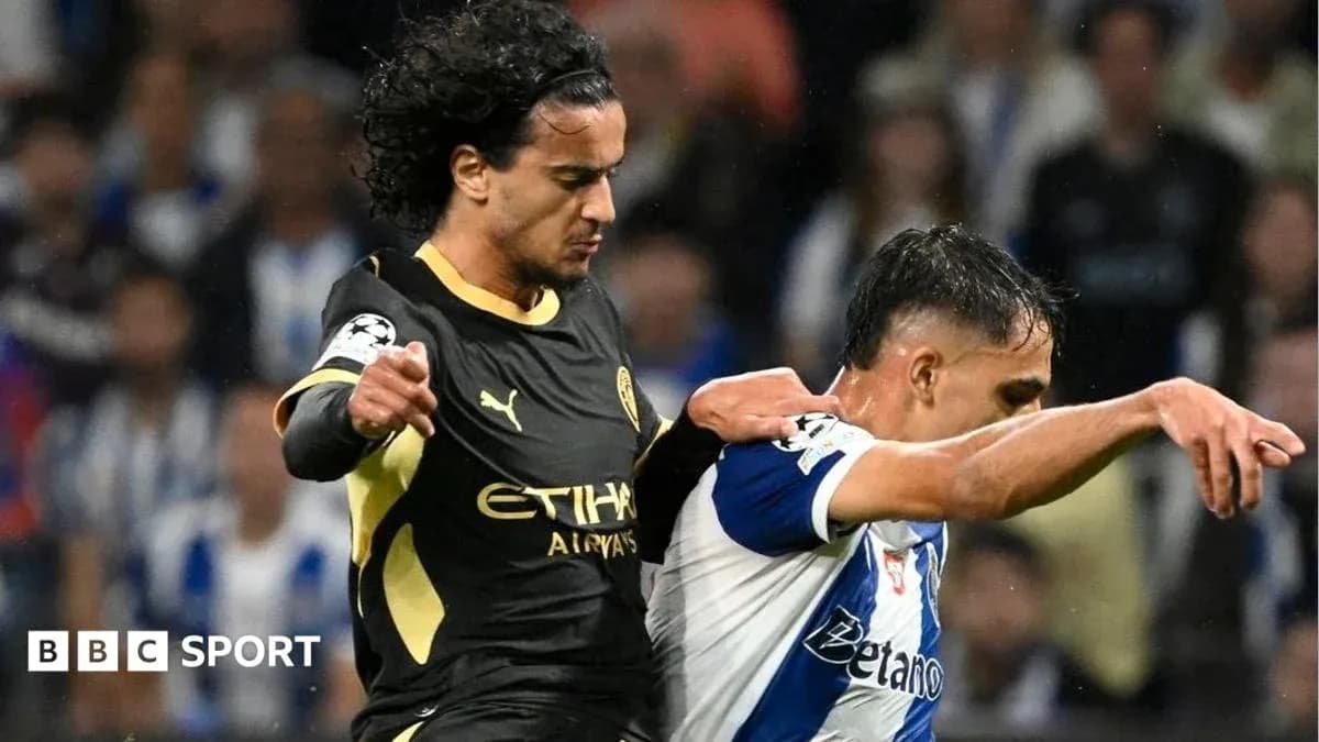 Jugador de Manchester City desafiando a oponente de Porto