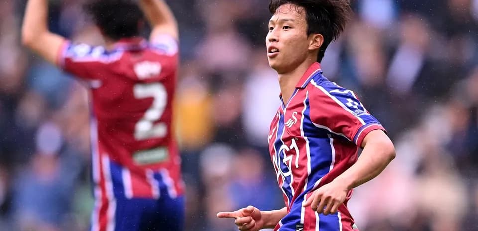 Jugador celebrando durante un partido de fútbol