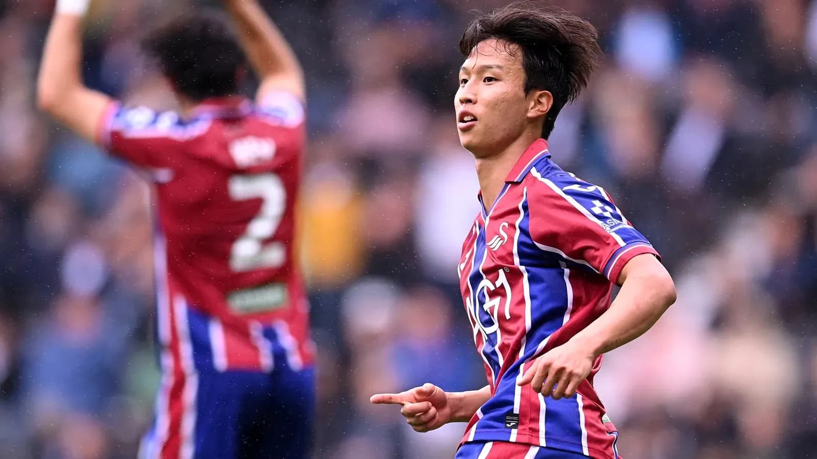 Jugador celebrando durante un partido de fútbol
