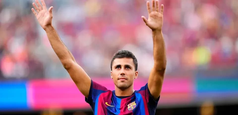 Jugador de Barça saludando al público en el estadio