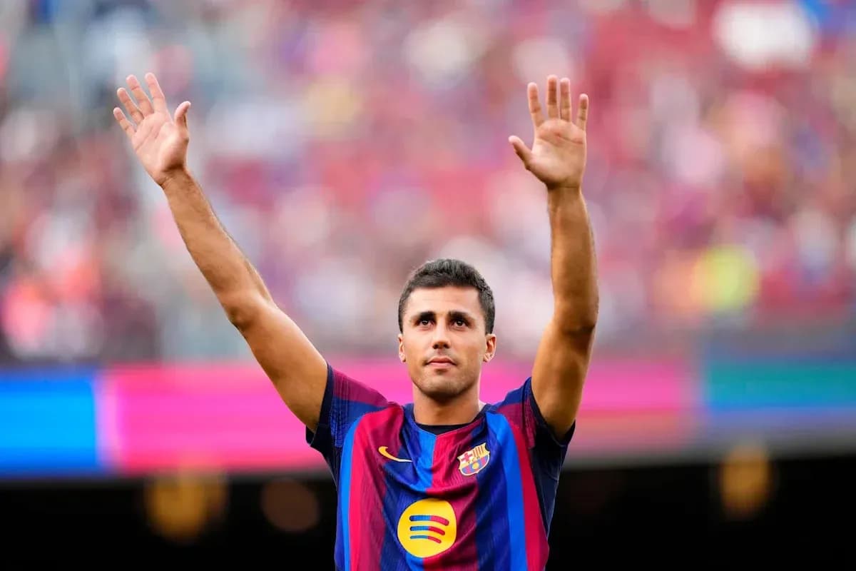 Jugador de Barça saludando al público en el estadio