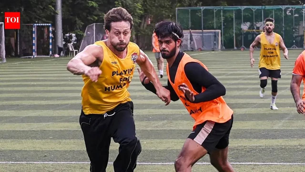 Dos jugadores corriendo durante una sesión de entrenamiento
