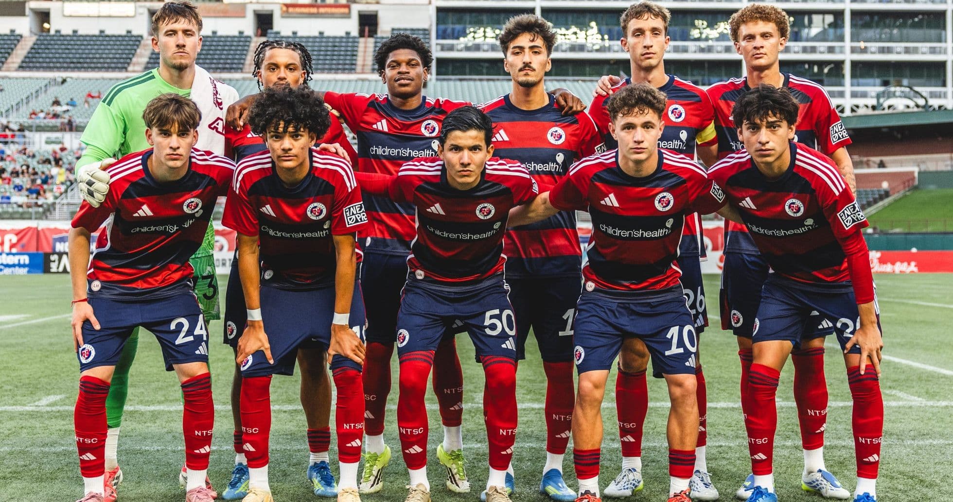 Equipo de North Texas posando antes del partido