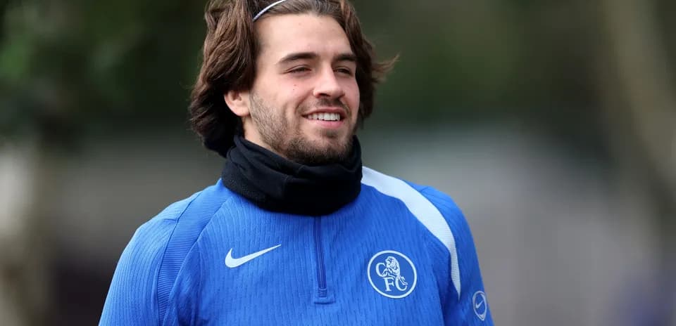 Jugador sonriendo durante sesión de entrenamiento