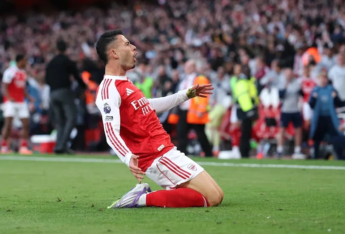 Jugador celebrando un gol en el estadio Emirates