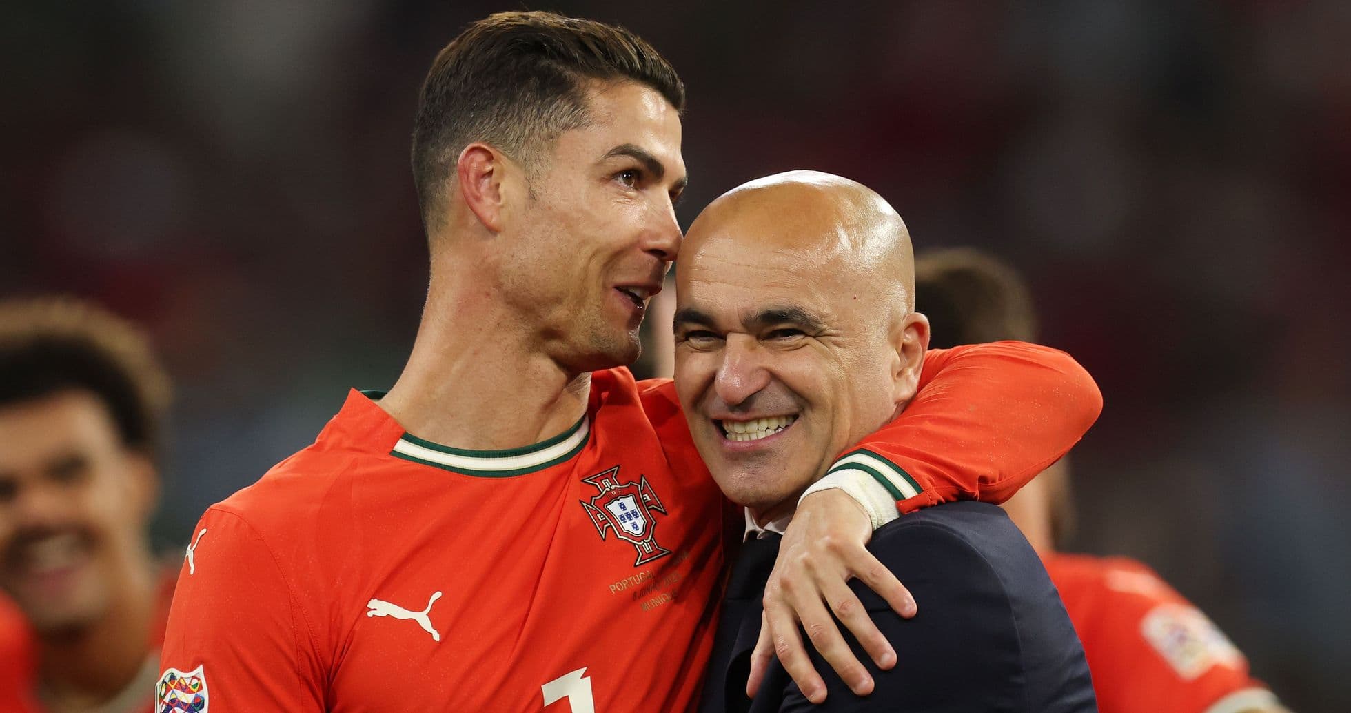 Cristiano Ronaldo y entrenador celebrando juntos