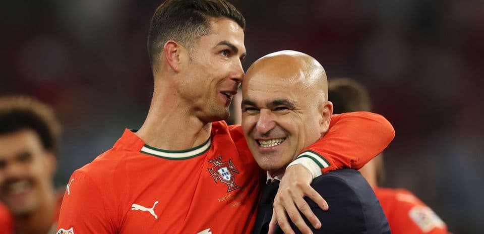Cristiano Ronaldo y entrenador celebrando juntos