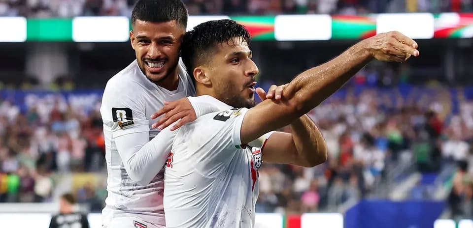 Jugadores de Irán celebrando un gol en partido