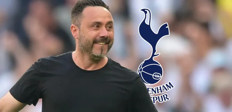 Entrenador sonriente de Tottenham en el campo