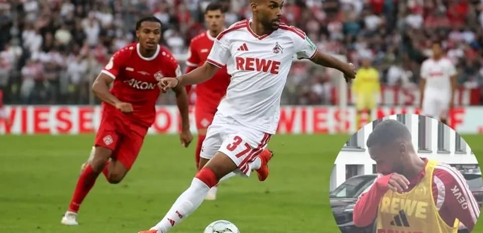 Jugador del FC Köln corriendo con el balón durante el partido