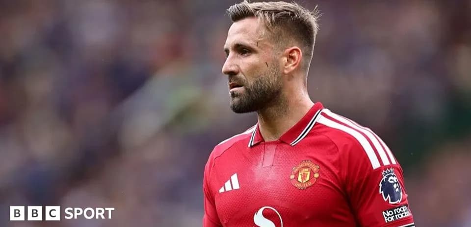Jugador de Manchester United en uniforme rojo