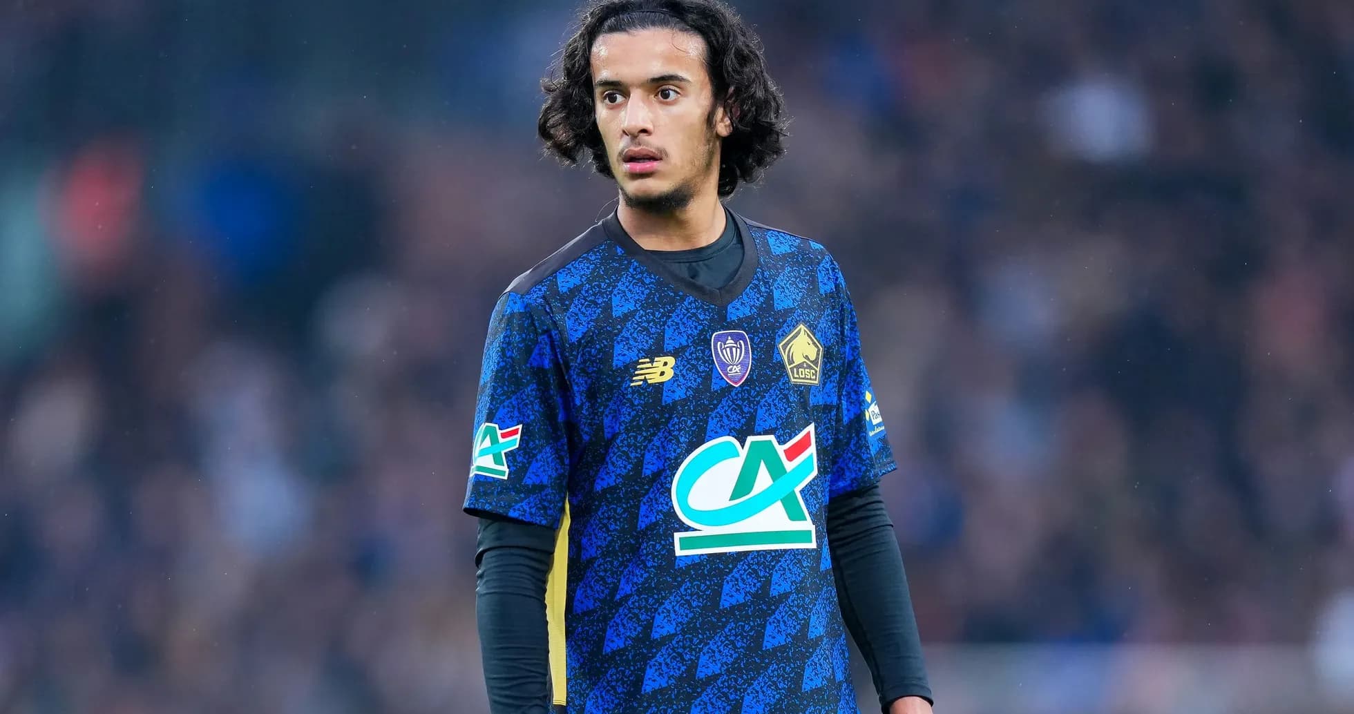 Jugador de Lille OSC en acción durante el partido
