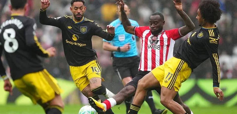 Jugadores en acción durante el partido Sunderland vs Manchester United