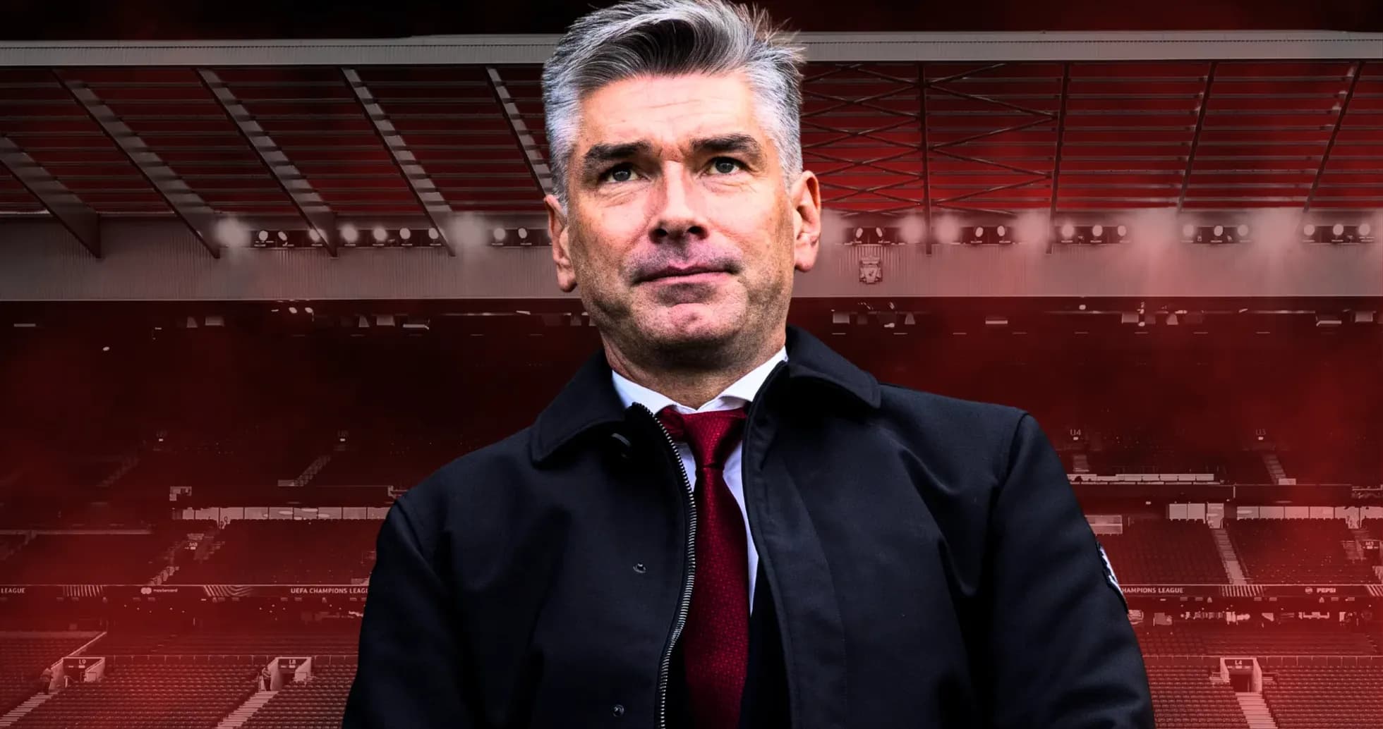 Entrenador posando en el estadio con fondo oscuro