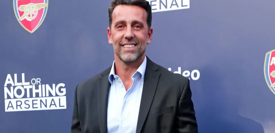 Persona sonriente en evento de Arsenal