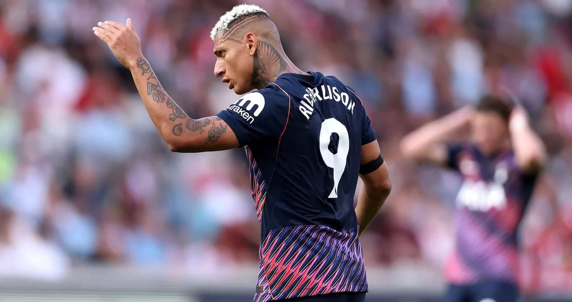 Richarlison gesturing on the field during match Richarlison gesturing on the field during match