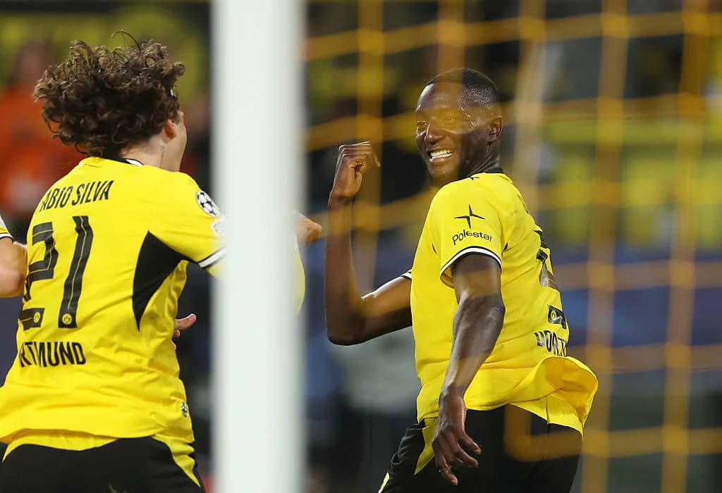 Jugadores de Dortmund celebrando un gol en el partido Jugadores de Dortmund celebrando un gol en el partido