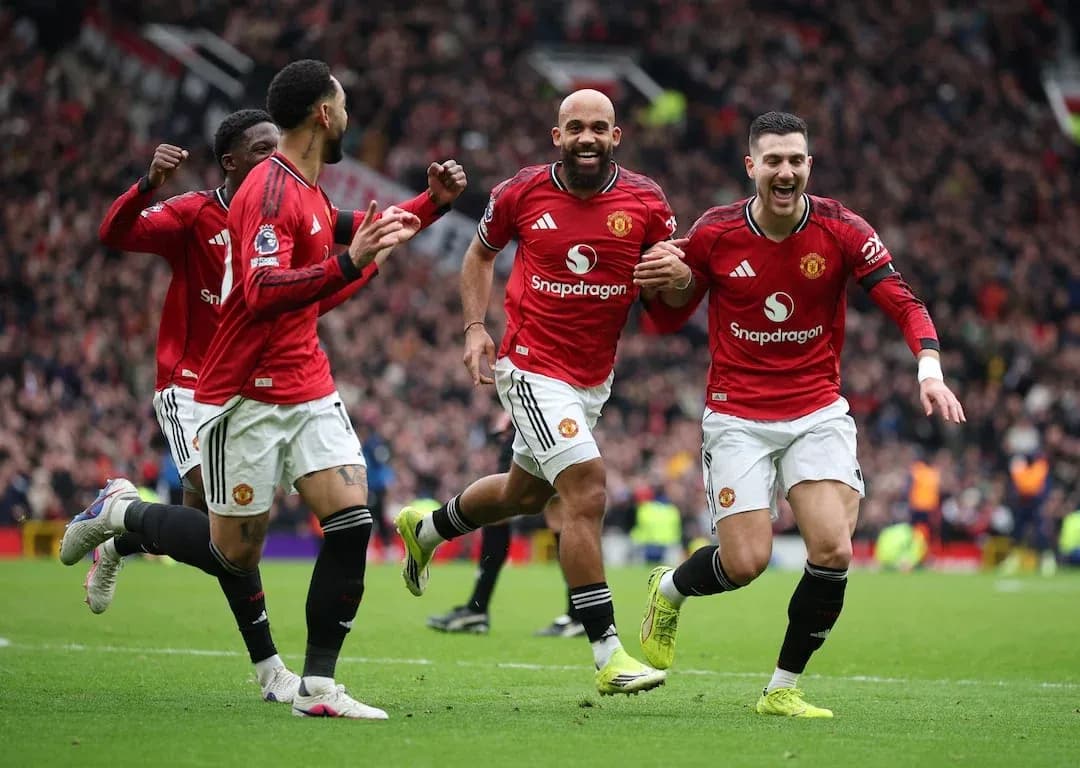 Jugadores del Manchester United celebrando un gol Jugadores del Manchester United celebrando un gol