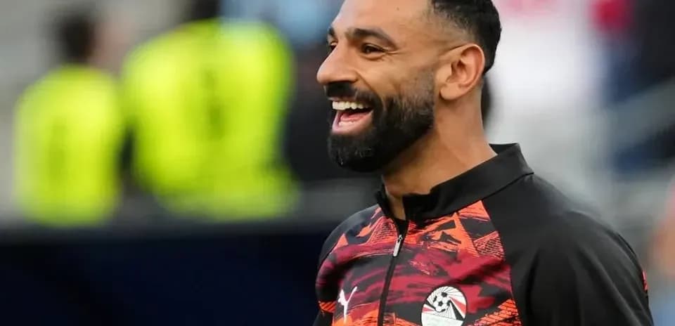 Jugador sonriendo durante el calentamiento previo al partido Jugador sonriendo durante el calentamiento previo al partido