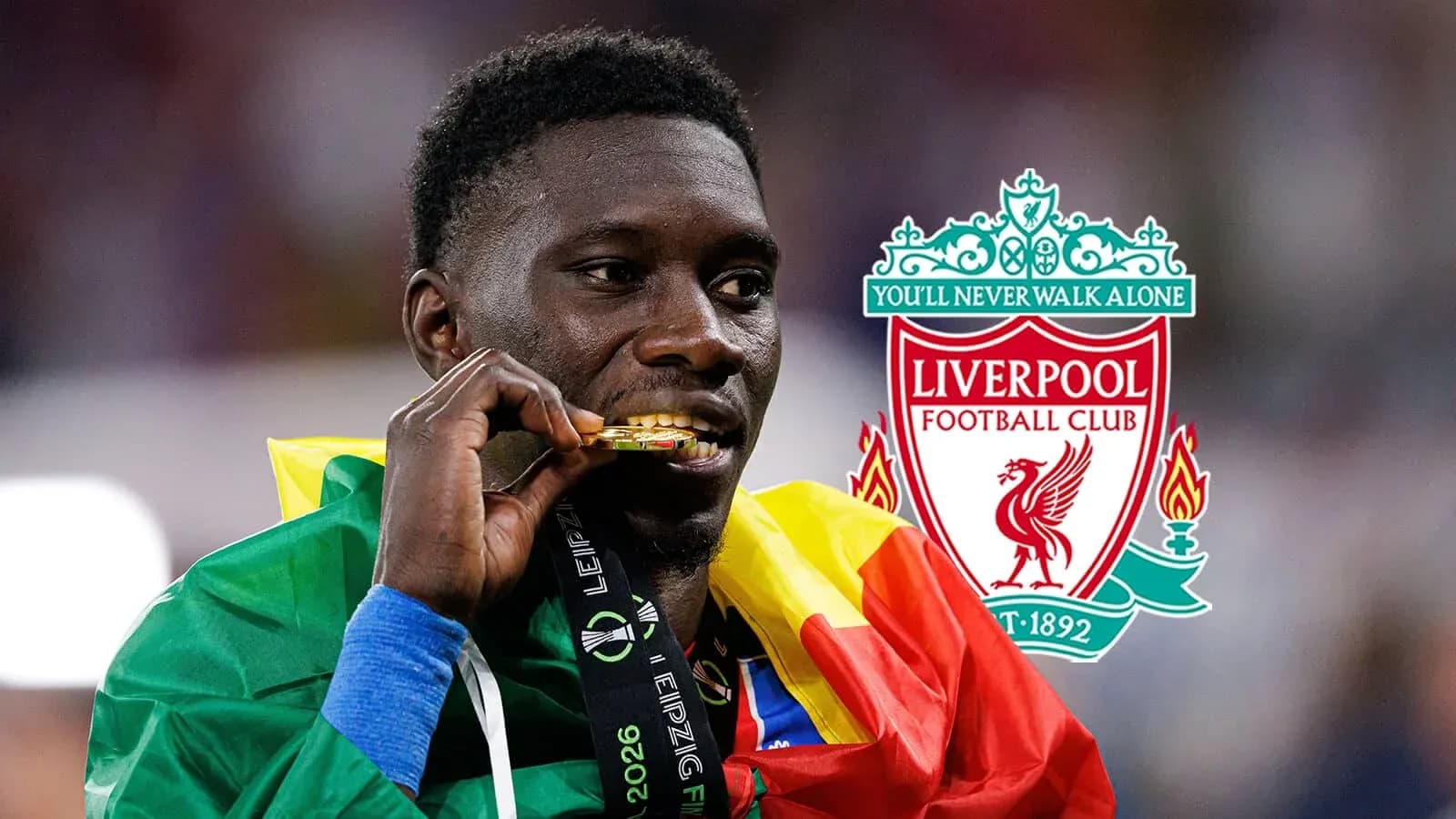 Jugador con medalla dorada y bandera de Camerún Jugador con medalla dorada y bandera de Camerún