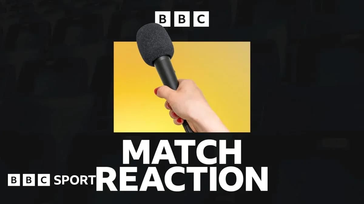 Mic held up for post-match interview Mic held up for post-match interview